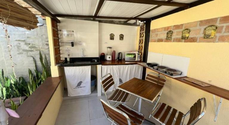 Suites Curio - Passarim Hospedagem — photo 3