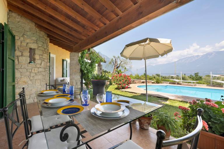 Villa with grill, patio & private pool | Garden view in Toscolano Maderno