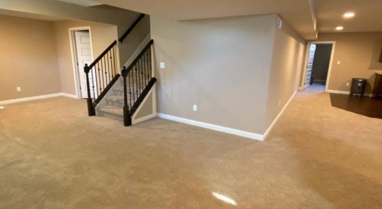 Private basement bedroom with private bathroom, kitchen, and living room with large screen televisio — photo 5