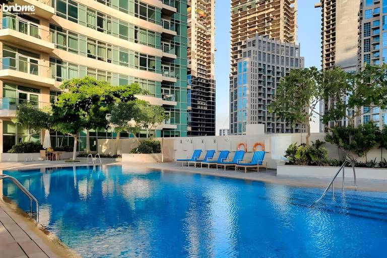 Fully equipped rental apartment with garden & pool | Next to Burj Khalifa | Perfect for remote work | Pets are welcome in Dubai
