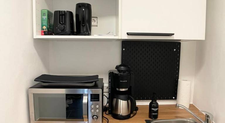 Urban Haven-Zentrum-3 Schlafzimmer-5 Einzelbetten-Waschmaschine — photo 3