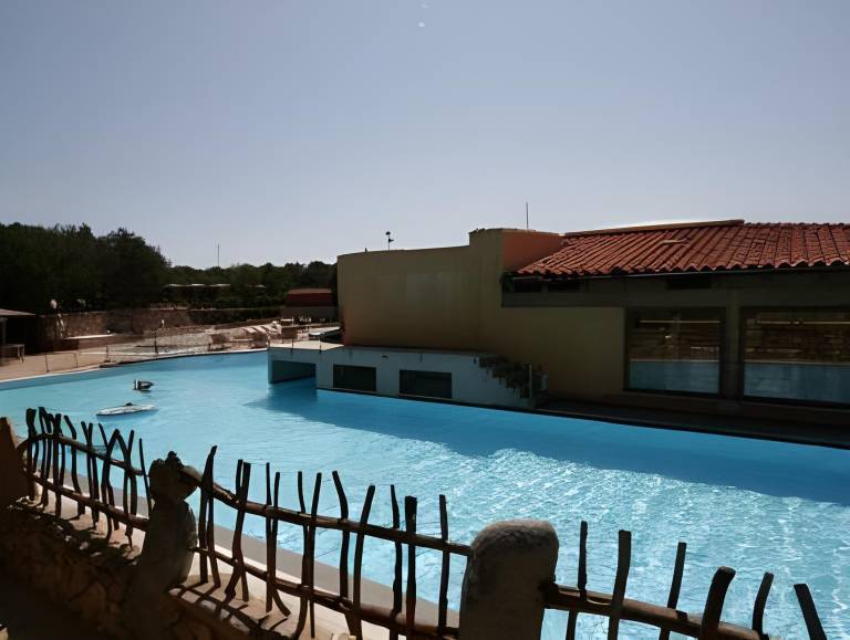 Serviced apartment with garden, pool & patio | Next to the beach | Dogs allowed in Arzachena