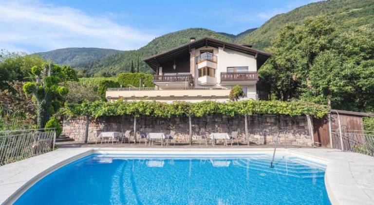 Apartment with pool, terrace & yard in Marlengo