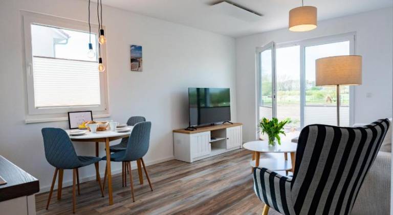 Ample holiday apartment with garden & barbecue | Next to the beach | Pets are welcome — photo 4