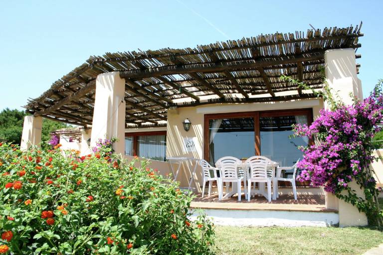 Vacation home with yard, patio & barbeque | Nature view in Stintino