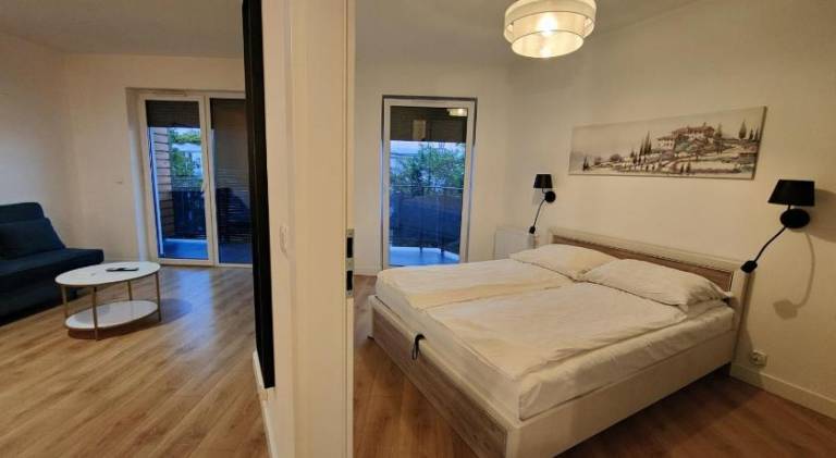 Apartment with patio in Torun