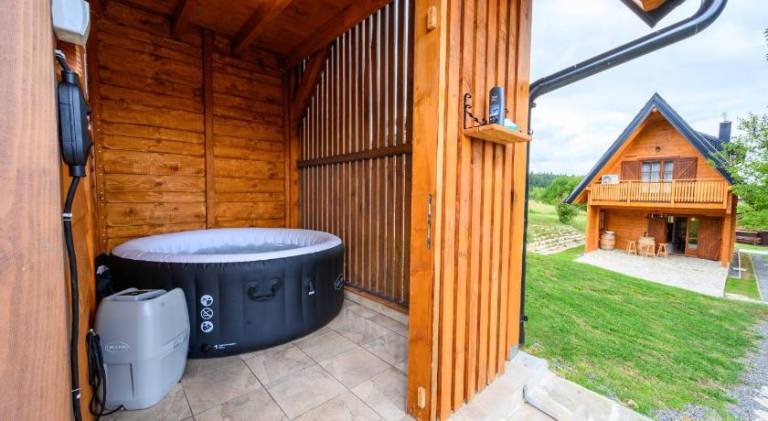 Chalet with hot tub — photo 3