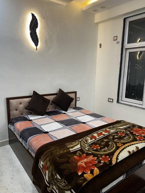 Private cosy room in a welcoming apartment in Noida