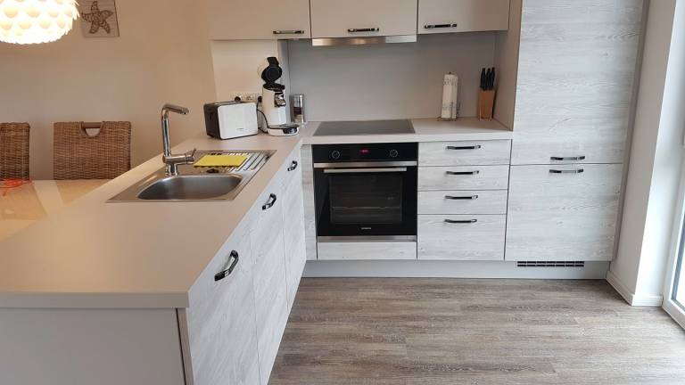 Apartment mit 2 Schlafzimmern, offener Küche, Wohnbereich und Wellnessbad. — photo 4