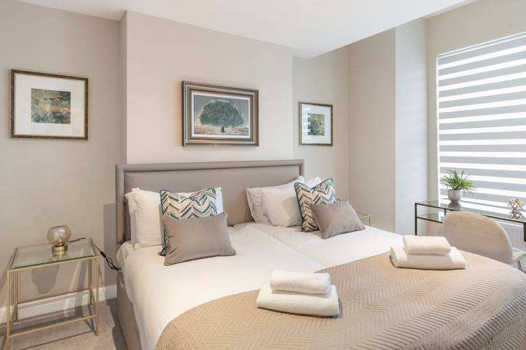 Earthy Elegance Stylish 4BR for Urban Escapes