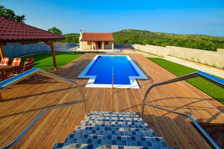House with barbeque, garden & private pool | Garden view in Vodice