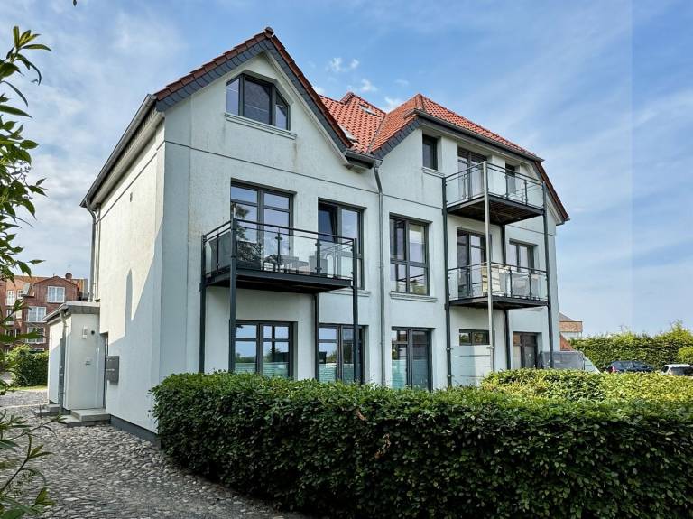 Maritimes Lebensgefühl in bester Lage – stilvoll entspannen im Herzen des Hafens von Orth in Fehmarn