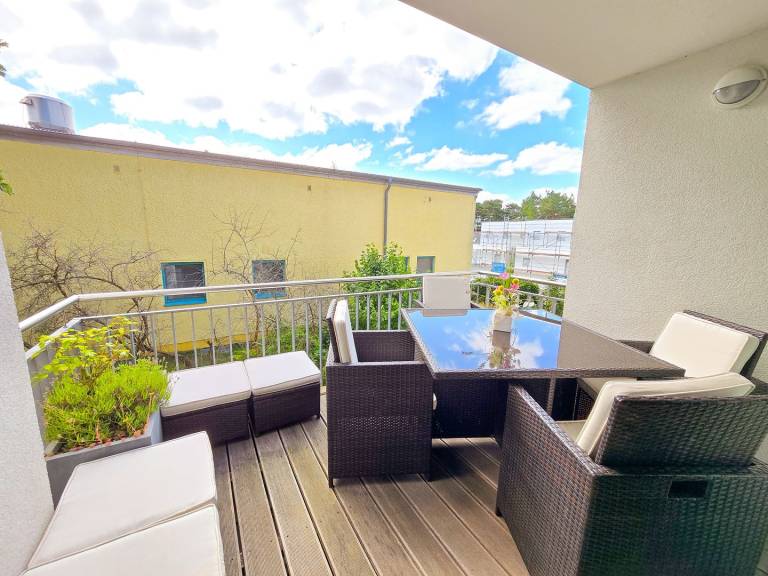 Ferienwohnung mit 1 Schlafzimmer, Kamin und Balkon in Binz
