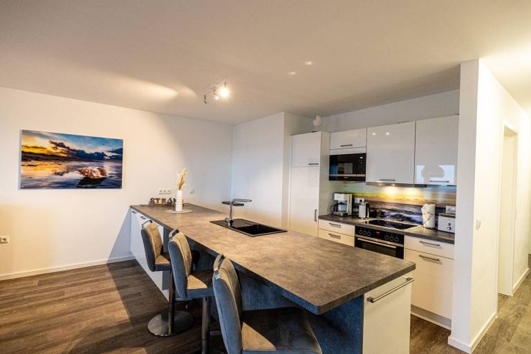 Moderne Ferienwohnung, Kamin, Sauna, großer Balkon, Meerblick, strandnah — photo 3
