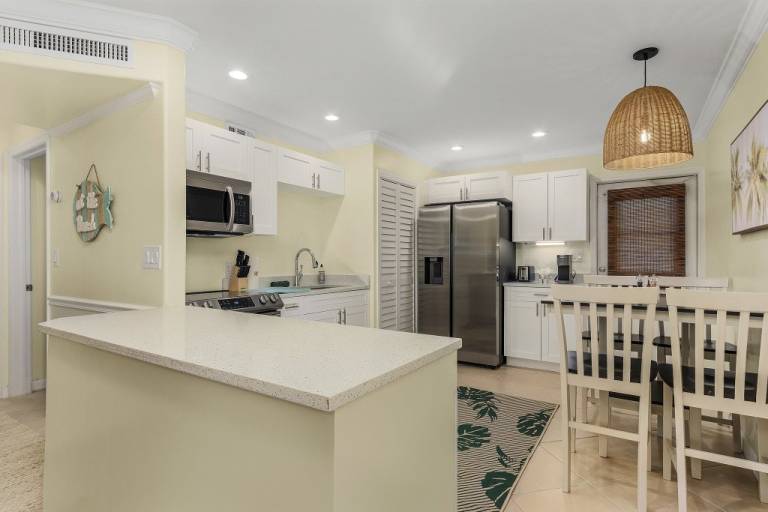 Family-oriented condo with patio | Pet-friendly — photo 4