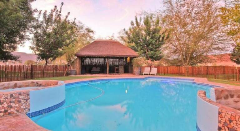 Lodge with pool, grill & yard — photo 2