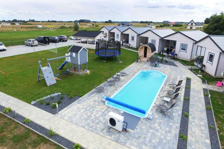 Family-oriented charming vacation home with terrace, jacuzzi & yard | Dogs allowed in Koszalin