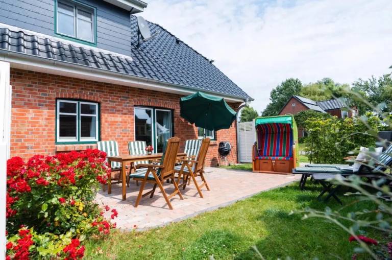 Ferienhaush&auml;lfte Hafenperle mit Garten und Wi Fi
