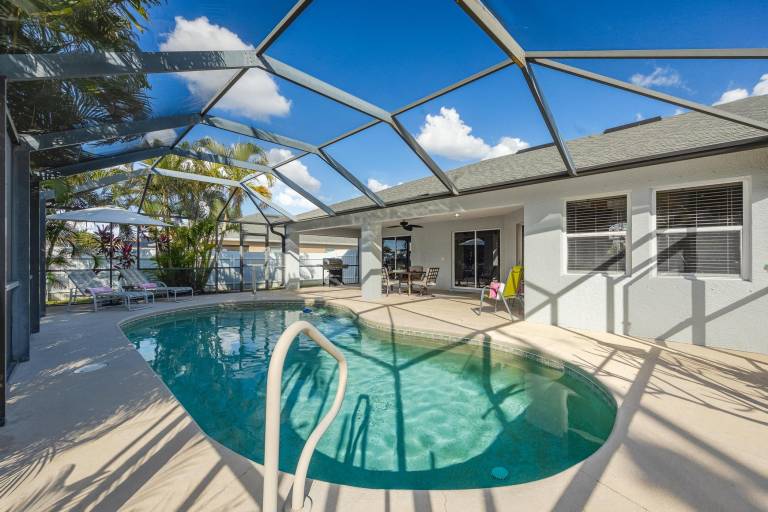 Family-friendly ample house with private pool, grill & garden | River view | Perfect for remote work | Pet-friendly in Cape Coral, FL