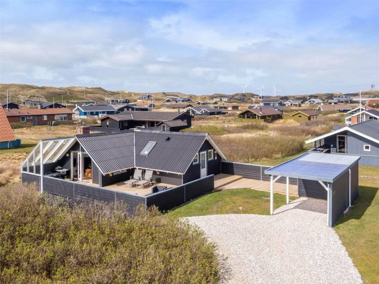 Vacation home with barbeque, terrace & yard in Hvide Sande