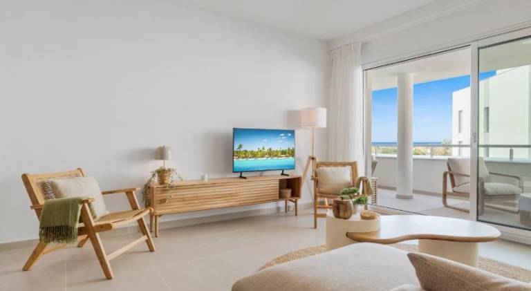 Holiday apartment with patio, yard & pool in Estepona
