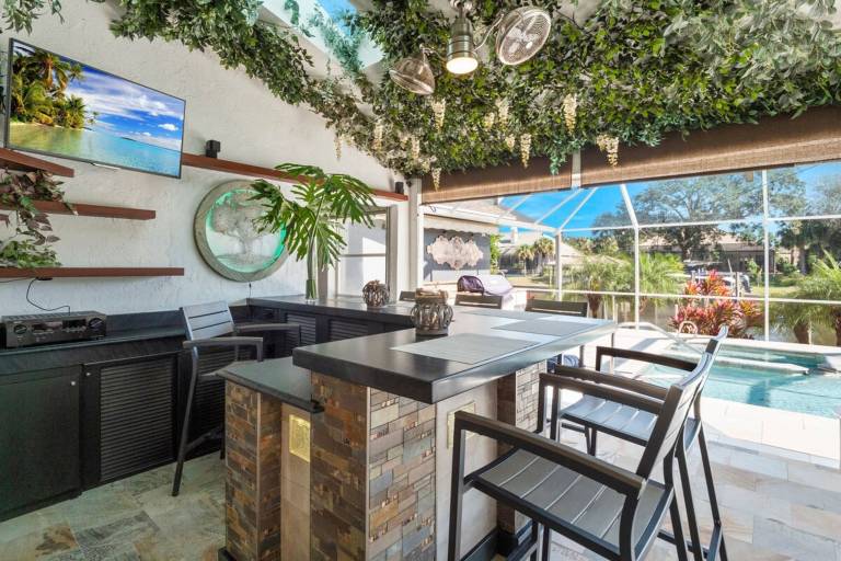 Luxury Heated Pool Home on Saltwater Canal w Tiki — photo 3