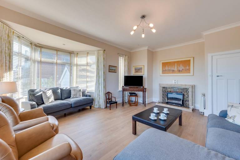 Family-oriented pleasant cottage with grill, yard & patio | Next to the beach | Pet-friendly — photo 3