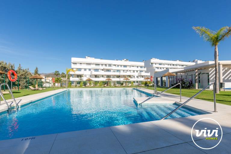Apartment with pool, yard & terrace in Estepona