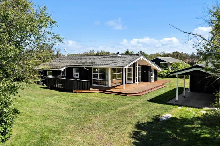 Vacation home with sauna, barbeque & hot tub in Lokken