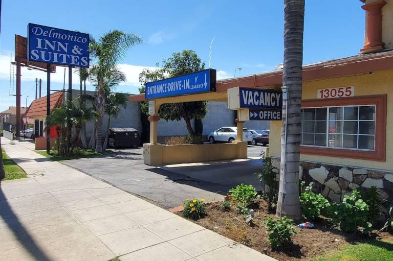 Delmonico Inn & Suites