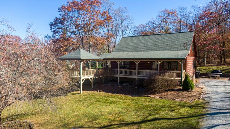 A Bears Hill Log Cabin in Boone with hot tub large yard and pond — photo 2