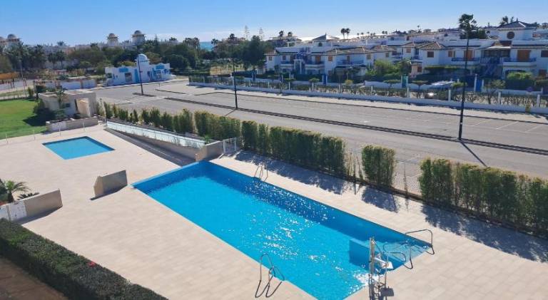 Apartment with yard, terrace & private pool in Playas