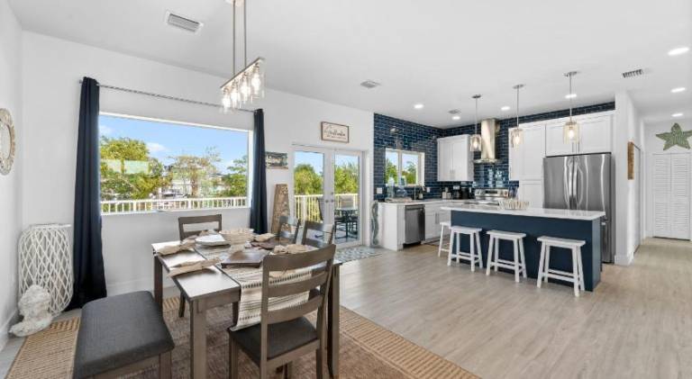 Blue Pearl New Waterfront Haven with Heated Pool, 70 Foot Dock, and More! — photo 2