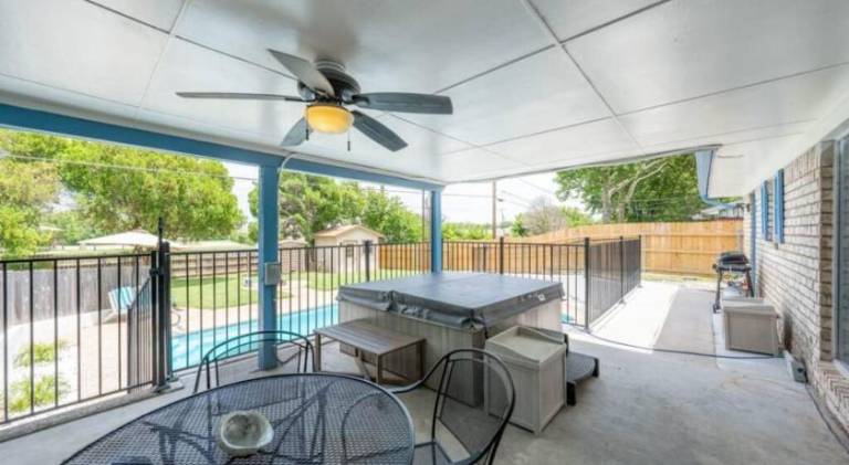 The Breezy Blue View with hot tub and pool — photo 4