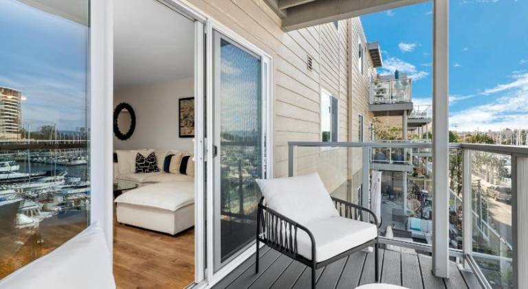 Serenity Over the Sails - A 2-Bedroom Escape w Stunning Marina Views — photo 2