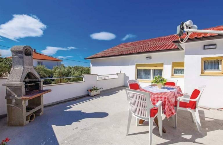 Two bedroom apartment with terrace and sea view Barbat, Rab (A-22498-b) in Rab
