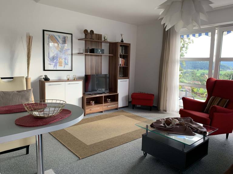 Child-friendly rental apartment with garden, pool & BBQ | Garden view | Dogs allowed — photo 2