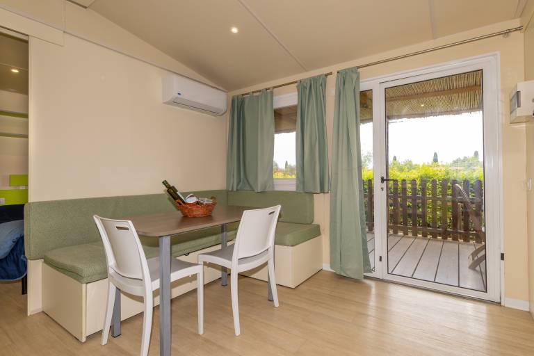 Bungalow 'Sole1' with Shared Pool, Private Terrace and Air Conditioning — photo 4