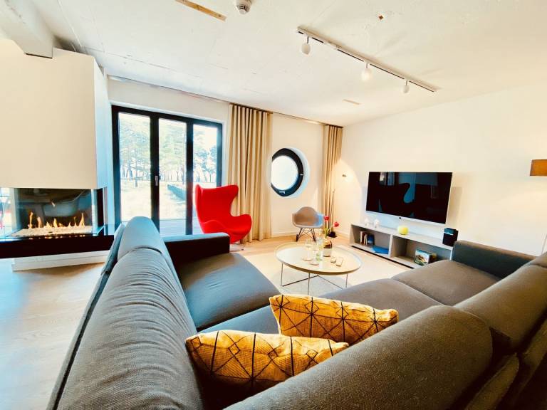 Luxus Unterkunft Proraloft 6 in Prora Düne 7 mit wohnungseigener Sauna und Kamin in Binz