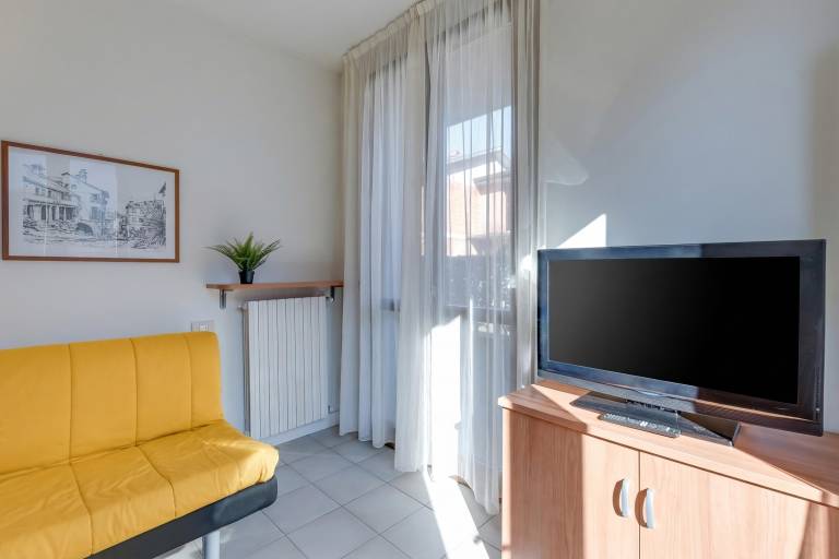 Wonderful holiday apartment with garden & patio | Mountain view | Next to the beach | Pets allowed in Porlezza