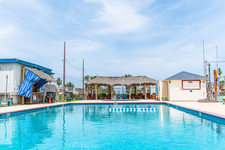 Vacation home with pool & grill in Galveston, TX