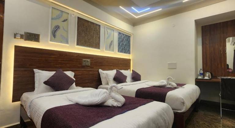 Hotel Maitreya Inn near CMC Hospital VIT Sripuram Temple Naruvi Hospital