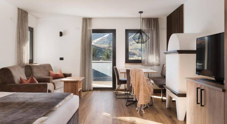 Aparthotel Familiaris - Family Apartments - Pools & Spa in Dolomites — photo 2