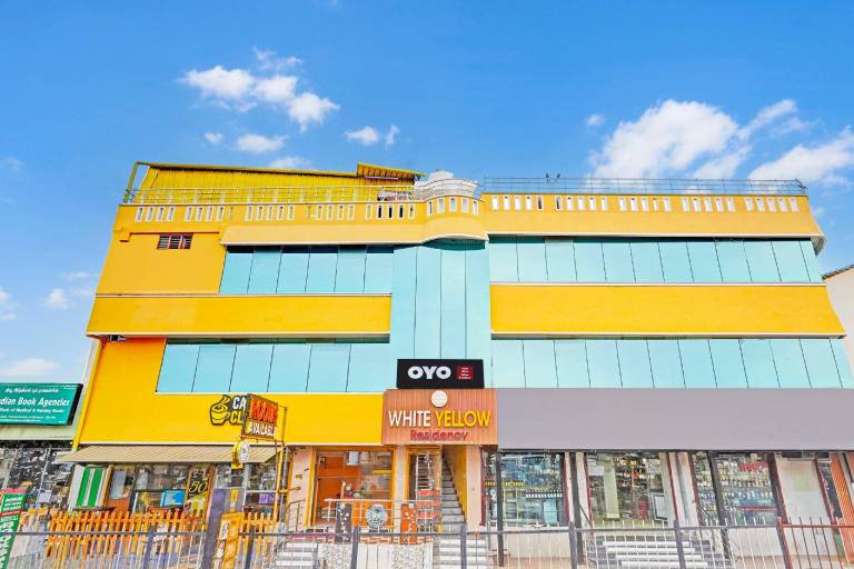 OYO WHITE YELLOW RESIDENCY