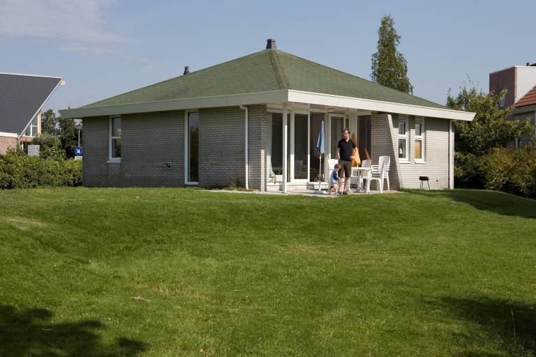 Ferienhaus mit Garten und Sauna | Strand in der Nähe | Haustiere erlaubt