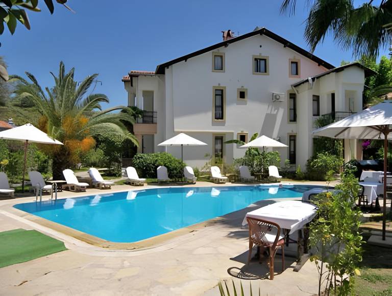 Serviced apartment with patio, yard & pool in Fethiye