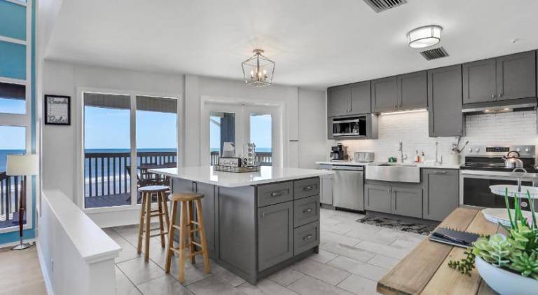 Gorgeous beachfront home with inviting deck & patio, hammock, amazing views — photo 2