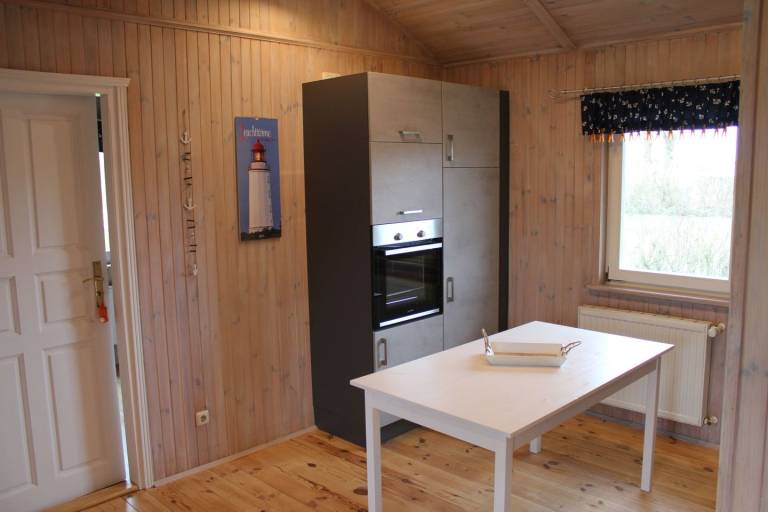 Komfortables Ferienhaus in Holzbauweise für fünf Personen — photo 3