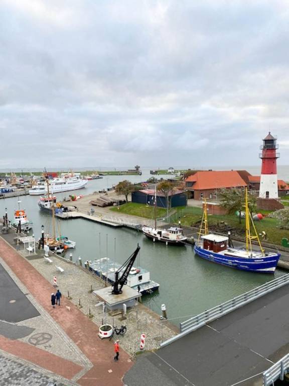 Wellness mit Hafen-Panorama: Ihr exklusives Apartment für 4 Personen und Haustier mit privater Sauna in Büsum