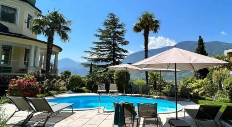 Holiday apartment with terrace, yard & pool in Marlengo